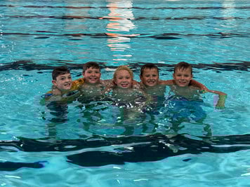 students in the pool